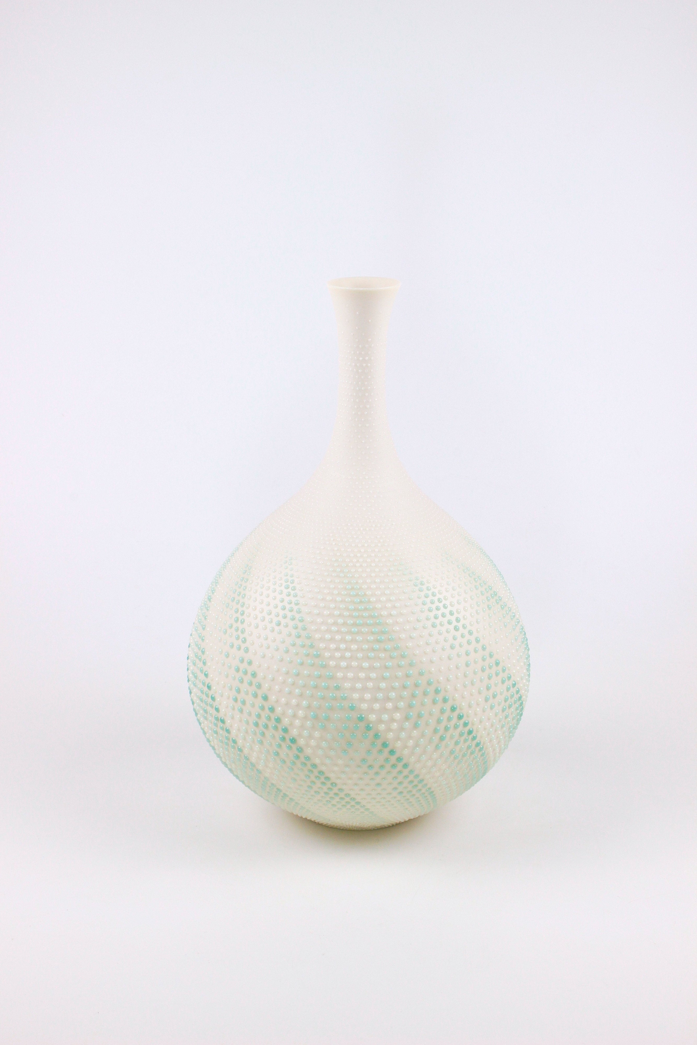 一輪 | 岡安 真美